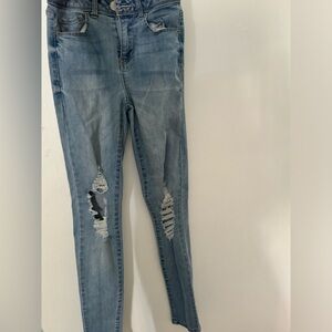 FASHIONOVA RIPPED LIGHT BLUE DENIM JEANS